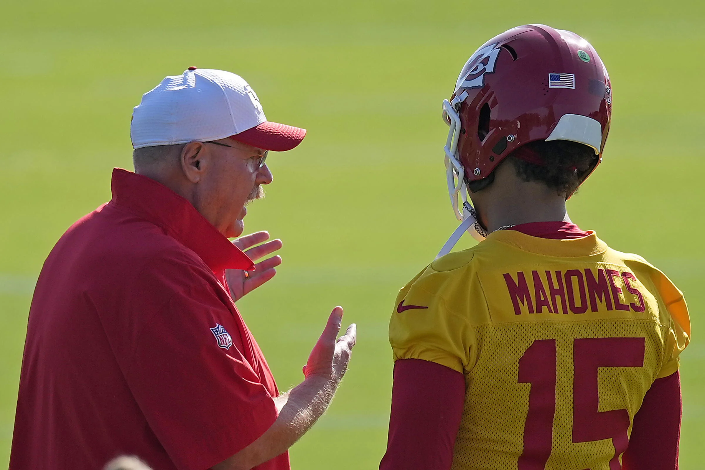NFL Training Camps Open as Chiefs Eye Fourth Consecutive Super Bowl NFL players running drills at training camp in summer